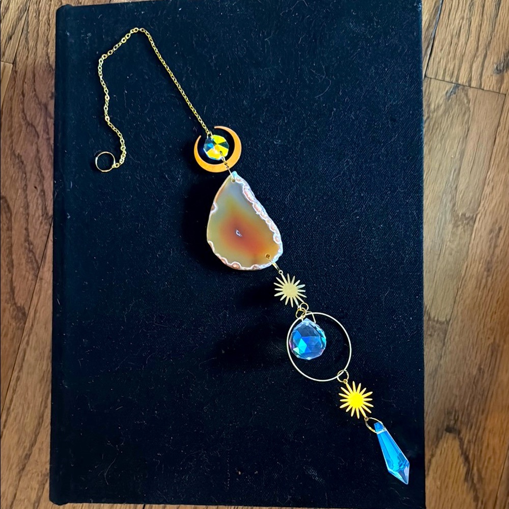 A eye catching sun catcher with a Citrine crystal
